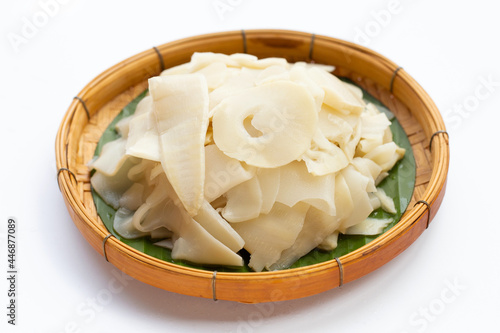 Preserved bamboo shoot slices on white background