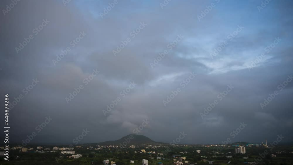 Windy stormy night to day break transition time lapse, fast moving clouds. Windy stormy night to day break transition time lapse, fast moving clouds.