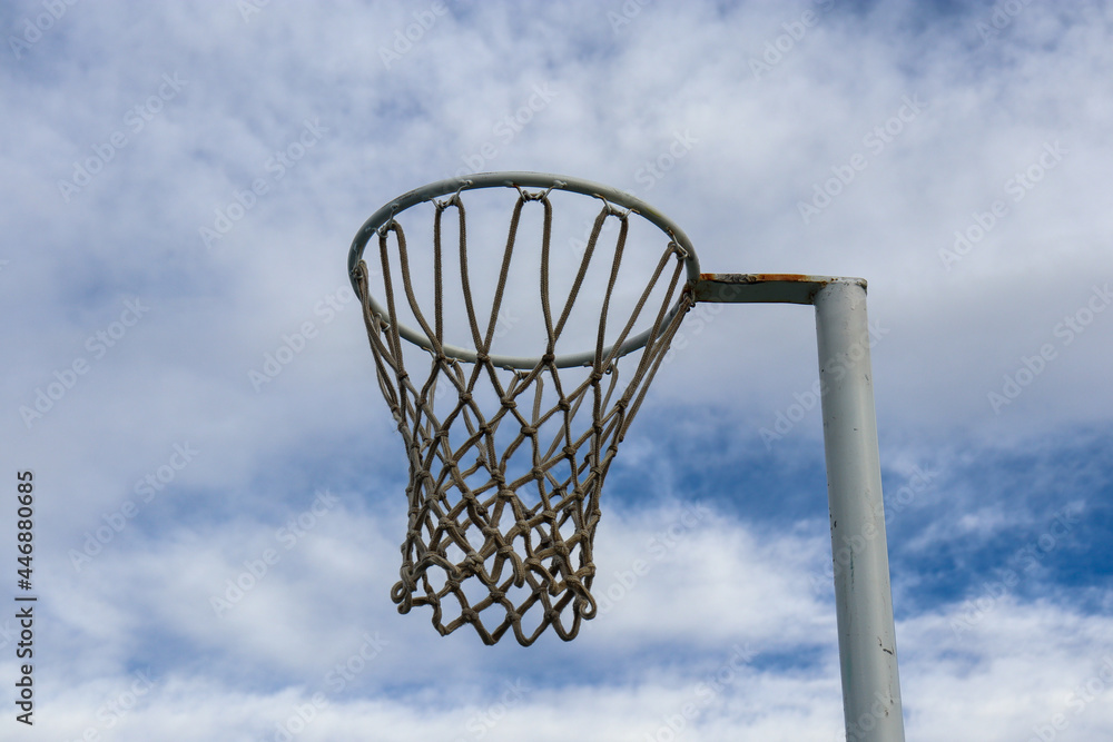 netball hoop against blue sky netball hoop against blue sky