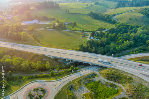 Aerial view of 70 road the Dwight D. Eisenhower highway near farm farmland in Bentleyville town in Pennsylvania US photo