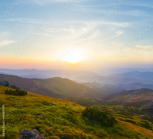 green mountain valley at the sunrise, travel mountain background © Yuriy Kulik