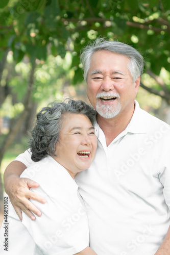 Happy love Elderly senior couple hugging smile face , Senior couple old man and senior woman relaxing hug in park © suphaporn