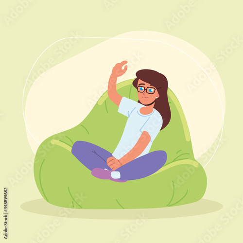 girl sitting in bean bag chair