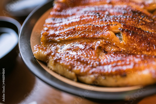 Close up of rice bowl topped with Unagi  grilled freshwater eel  in Japan                                                            