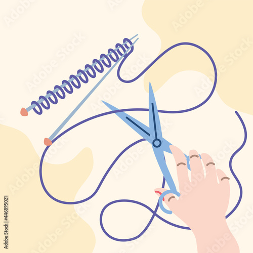 knitting hand with scissors