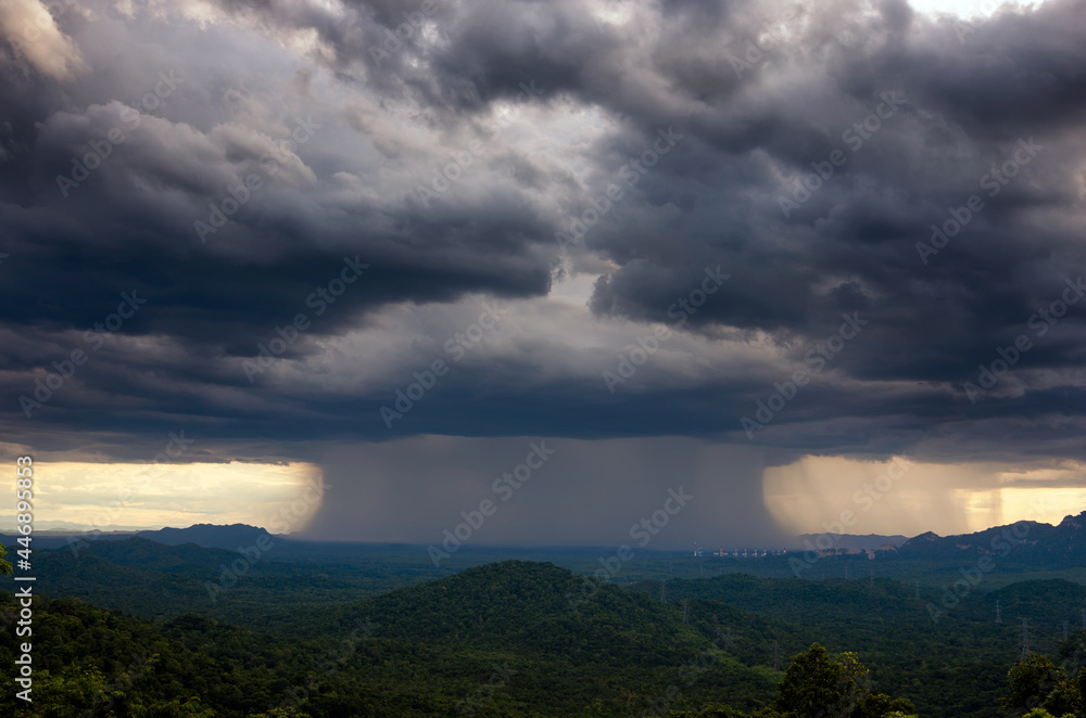 Beautiful rainstorm in the forest over a coal-fired power plant, Mae Moh, Lampang, Thailand. Beautiful rainstorm in the forest over a coal-fired power plant, Mae Moh, Lampang, Thailand.