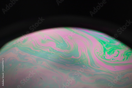 the beauty of the colorful pattern of soap bubbles is like a small planet