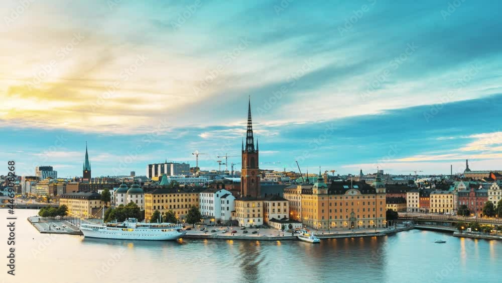 Stockholm, Sweden. Scenic Famous View Of Embankment In Old Town Of Stockholm At Summer. Gamla Stan In Summer Evening. Famous Popular Destination Scenic Place And UNESCO World Heritage Site Stockholm, Sweden. Scenic Famous View Of Embankment In Old Town Of Stockholm At Summer. Gamla Stan In Summer Evening. Famous Popular Destination Scenic Place And UNESCO World Heritage Site