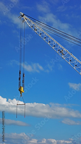 crane against blue sky, Honfleur, France