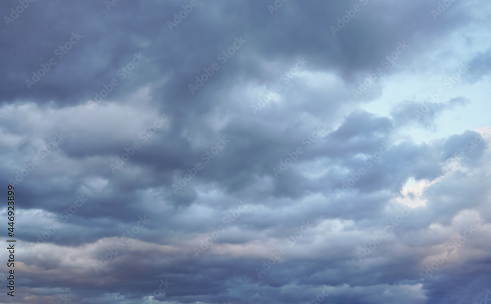 Evening sky with dark heavy clouds - as if storm coming