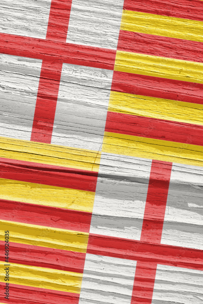 Fragment of the flag of the city of Barcelona on dry wooden surface, cracked with age. It seems to flutter in the wind. Vertical background or backdrop with municipal symbol. Old wood. Hard shadows Fragment of the flag of the city of Barcelona on dry wooden surface, cracked with age. It seems to flutter in the wind. Vertical background or backdrop with municipal symbol. Old wood. Hard shadows