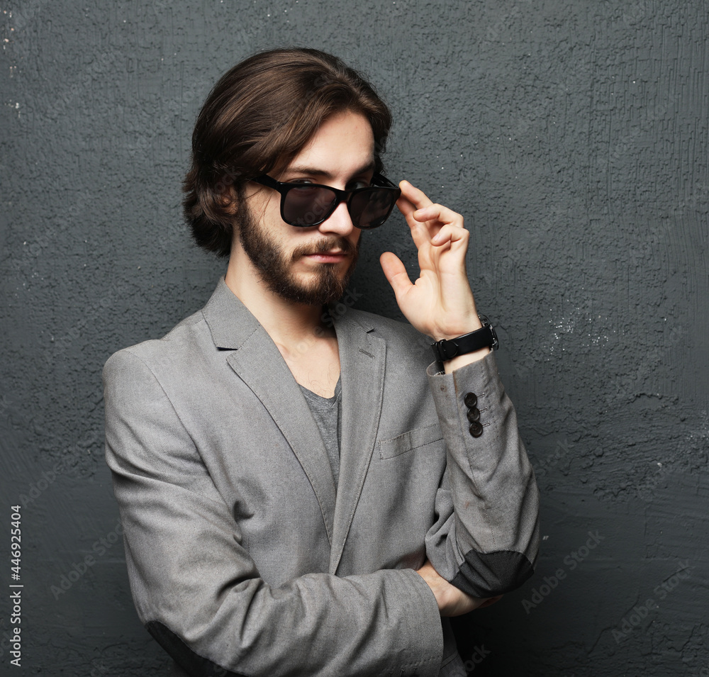 Portrait of a young handsome man wearing sunglasses Portrait of a young handsome man wearing sunglasses