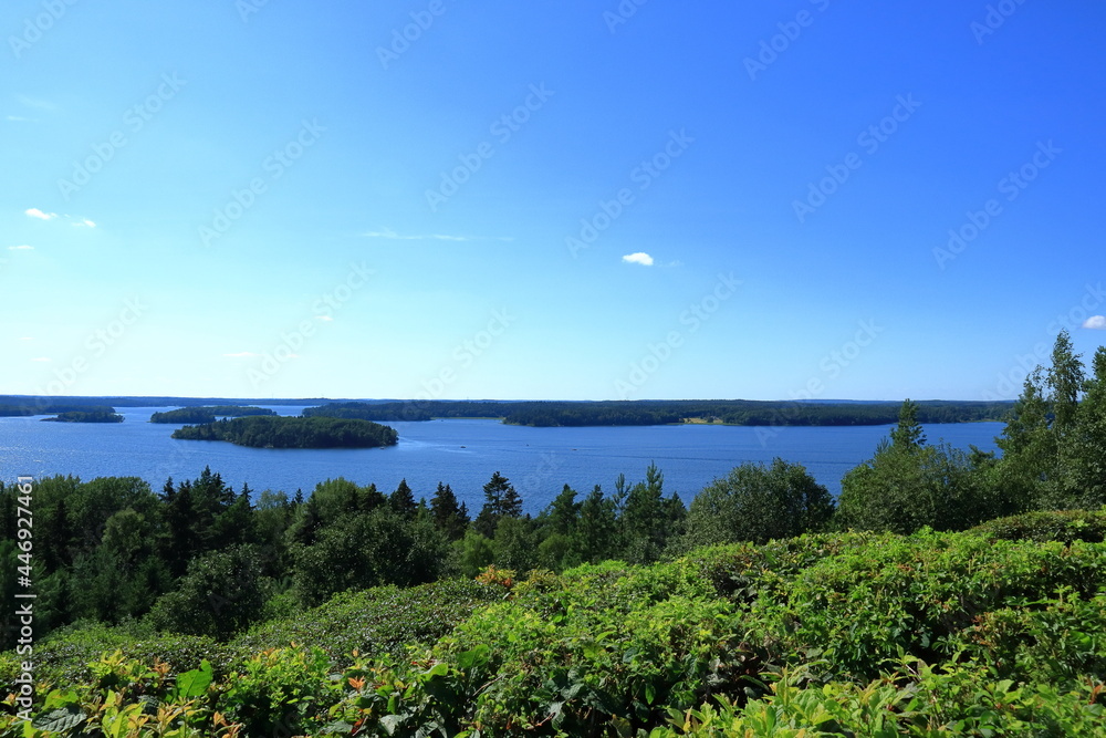 Great view from the top of a hill. Looking out over the Swedish lake Mälaren or Malaren. Nature during the summer. Nice weather and climate. Stockholm, Sweden, Scandinavia, Europe.