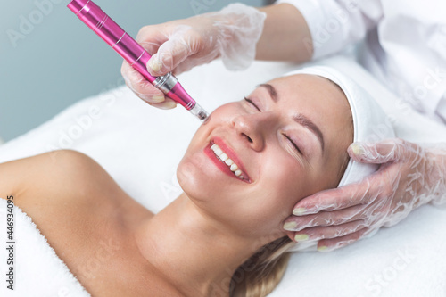 Woman having facial treatment in beauty salon, closeup. Oxy derma therapy