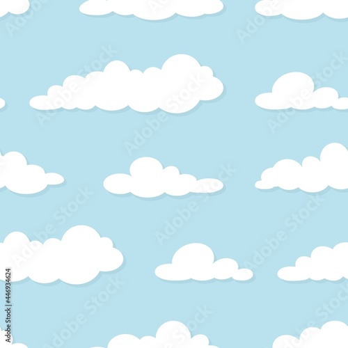 Cute seamless ornament with white clouds on powder blue background.