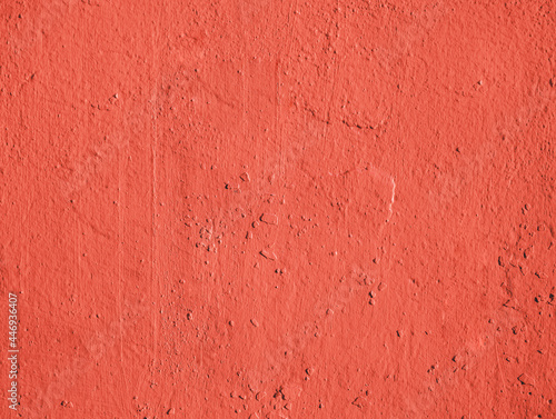Red plastered rusty concrete wall.
