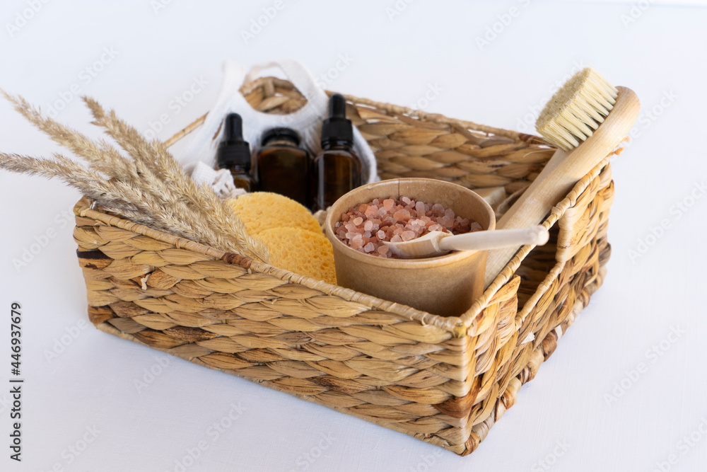 A gift spa box with essential oils, natural serum, soap, sponges and pink himalayan spa salt