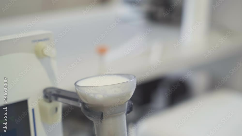 Specialist Taking Sample Of Milk For Thorough Analysis At Microbiology ...