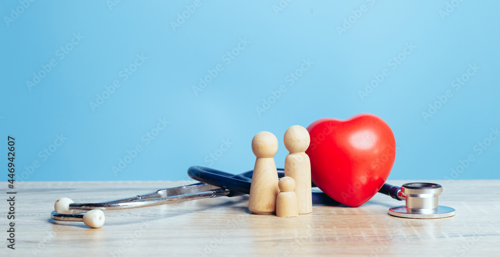 Family with stethoscope and a red heart. Concepts of a physical examination and Insurance family health live concept. Family with stethoscope and a red heart. Concepts of a physical examination and Insurance family health live concept.