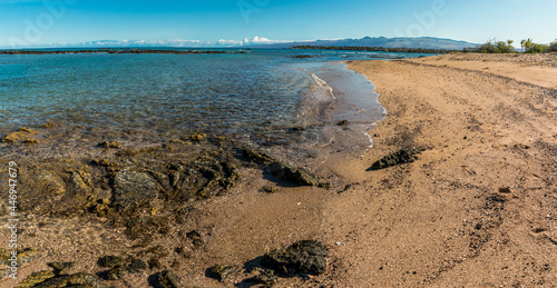 White Sand and Ancient Lava Flow  on Kapalaoa Beach and Anaeho'omalu Bay, Hawaii, Island, Hawaii, USA photo