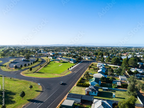 truck rest stop beside highway in remote aussie town in good season with green grass