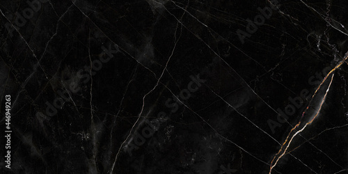 Black quartz natural stone texture. Black marble background with golden veins texture. black marble with gold veins, emperador marble natural pattern for background, luxury granite slab stone ceramic. © Michael Benjamin