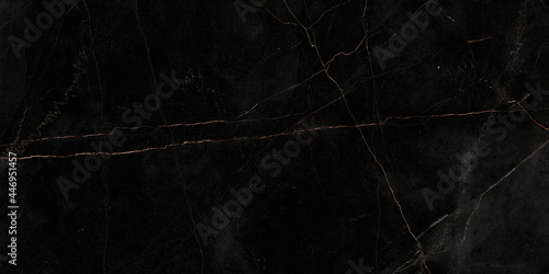 black marble with golden veins ,Black marbel natural pattern for background, abstract black and gold, black and yellow marble, , Yellow glittering marbel stone walls texture background.