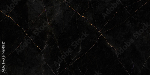 black marble with golden veins ,Black marbel natural pattern for background, abstract black  and gold, black and yellow marble, , Yellow glittering marbel stone walls texture background.