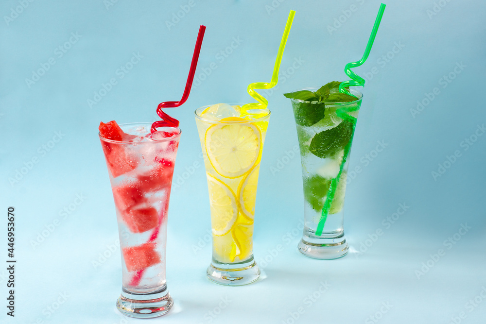 Refreshing summer drinks. Fresh drinks with ice. Cold lemonades: watermelon lemonade, lemon and mint are the best to quench your thirst in the summer heat. Watermelon, lemon, mint. Close-up. Copyspace Refreshing summer drinks. Fresh drinks with ice. Cold lemonades: watermelon lemonade, lemon and mint are the best to quench your thirst in the summer heat. Watermelon, lemon, mint. Close-up. Copyspace