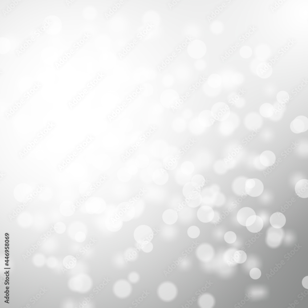 Winter light and white abstract bokeh on a bluish background Winter light and white abstract bokeh on a bluish background