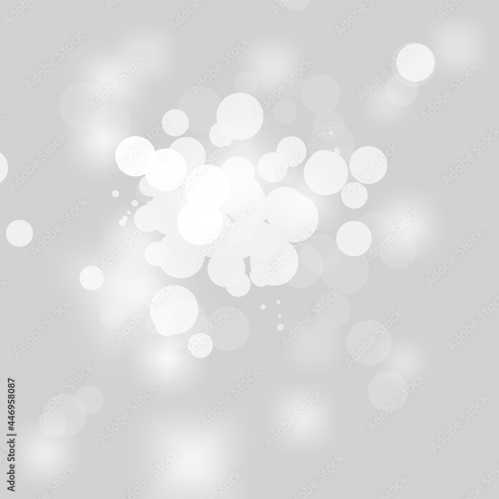 Winter light and white abstract bokeh on a bluish background Winter light and white abstract bokeh on a bluish background