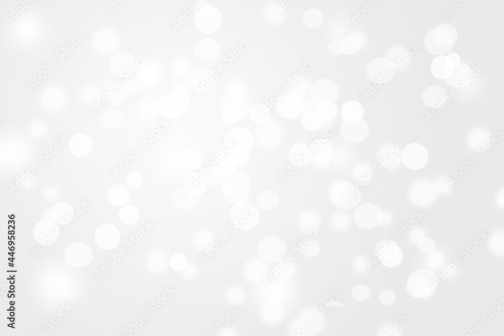 Winter light and white abstract bokeh on a bluish background Winter light and white abstract bokeh on a bluish background