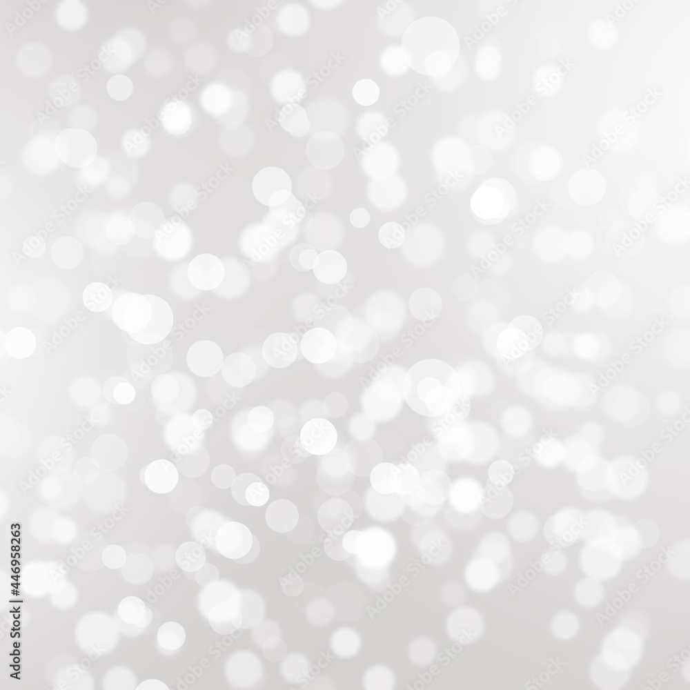 Winter light and white abstract bokeh on a bluish background Winter light and white abstract bokeh on a bluish background
