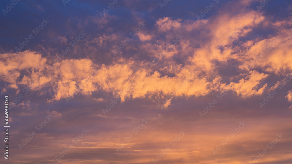sunset in the sky. Colorful clouds. Sun and cloud background with a pastel colored