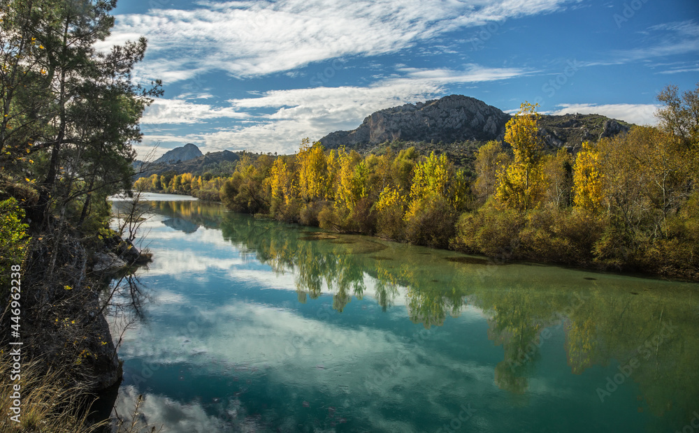 The turquoise waters of Köprüçay, a rafting center, and the yellow of autumn around it