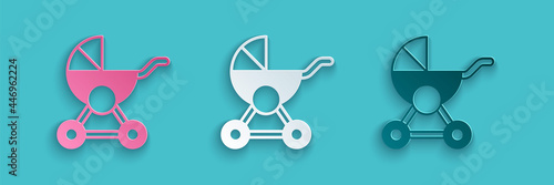 Paper cut Baby stroller icon isolated on blue background. Baby carriage, buggy, pram, stroller, wheel. Paper art style. Vector