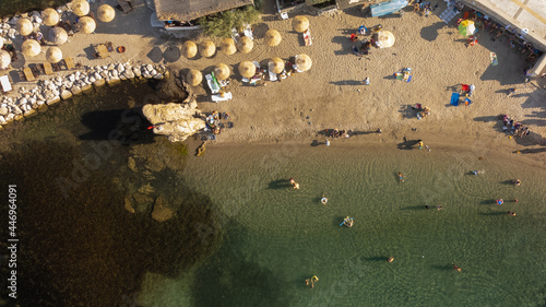 Top view of beach with umbrella. Golden sands, Izmir, Turkey. High quality photo