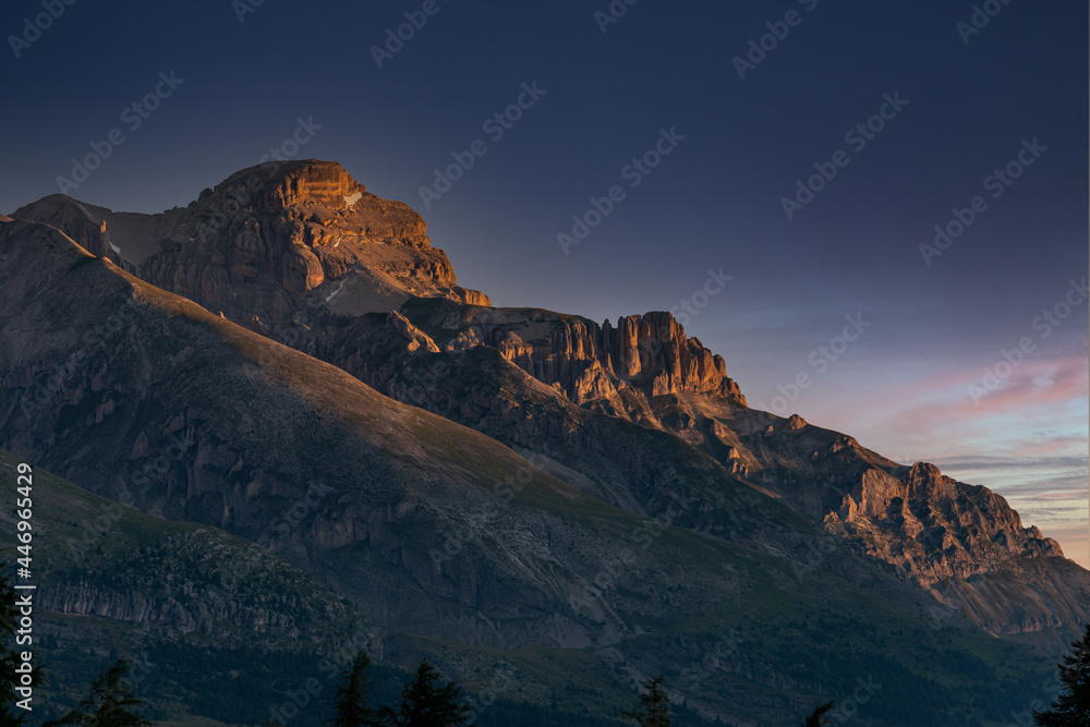 french alps at sunrise with the first light hiting mountain .adventure holidays .
