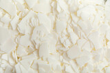 Flatlay with organic white soy wax flakes. Handmade candles, diy, hobby idea