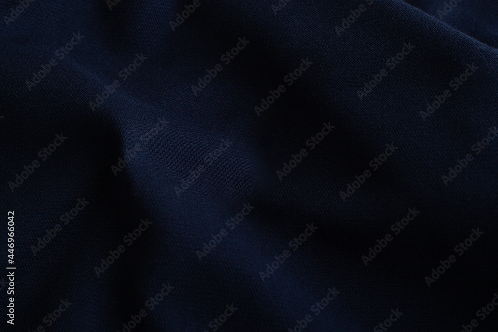 Dark blue textile background. Surface of navy fabric texture. Dark blue textile background. Surface of navy fabric texture.