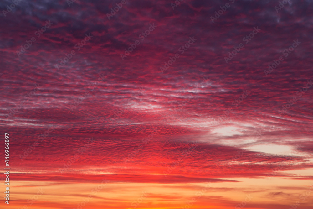 Epic Dramatic bright sunrise, sunset orange red pink sky with beautiful clouds in sunlight background texture	
