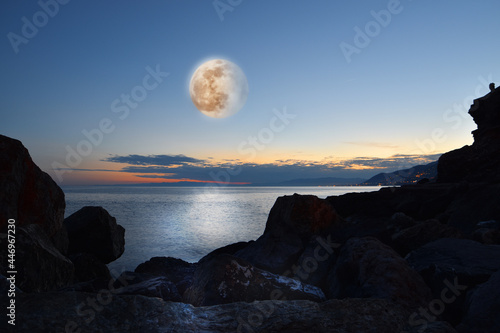 incredible full moon on the blue sea of Camogli
