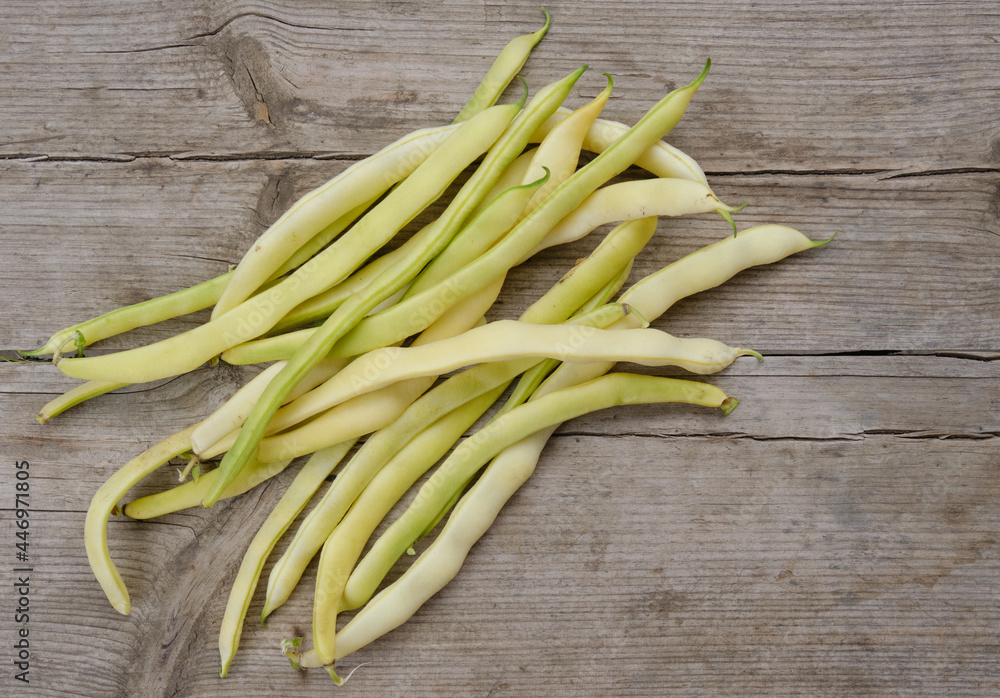 yellow beans on wooden background yellow beans on wooden background