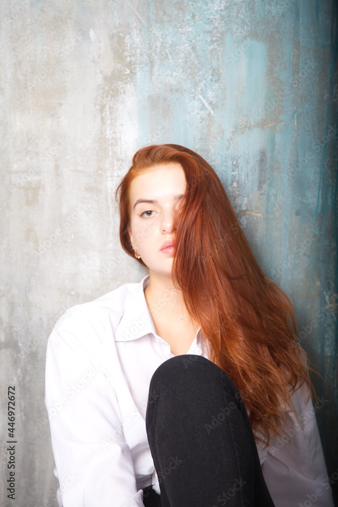 Fototapeta premium portrait of a young beautiful woman model fashion studio lifestyle