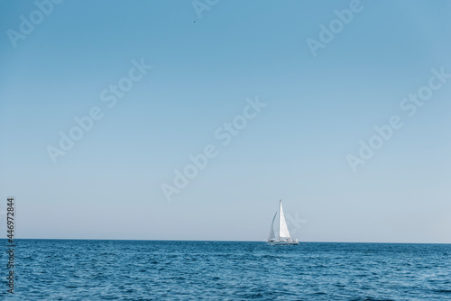 Sailing boat in navigation, Alghero