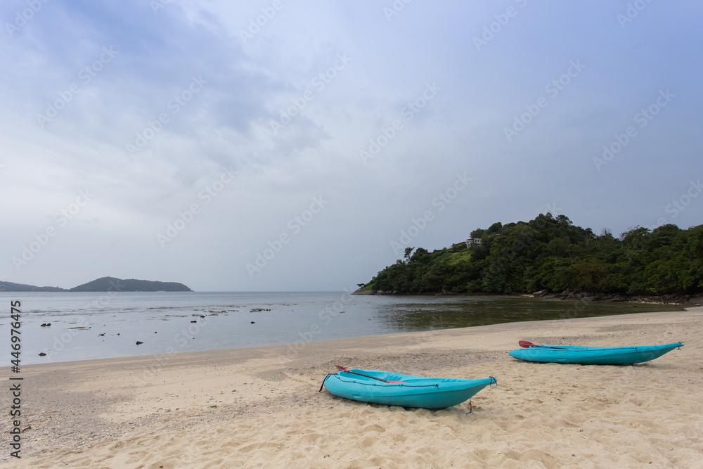 Rowboat moored. Empty sandy beach in summer. Rowboat moored. Empty sandy beach in summer.