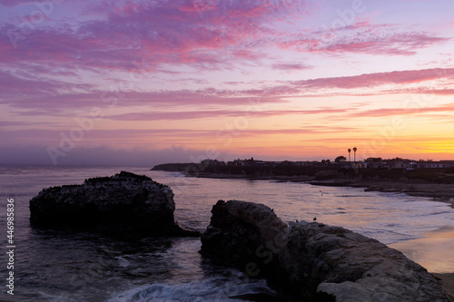 Vibrant Twilight Skies over Natural Bridges State Beach in Santa Cruz, California.