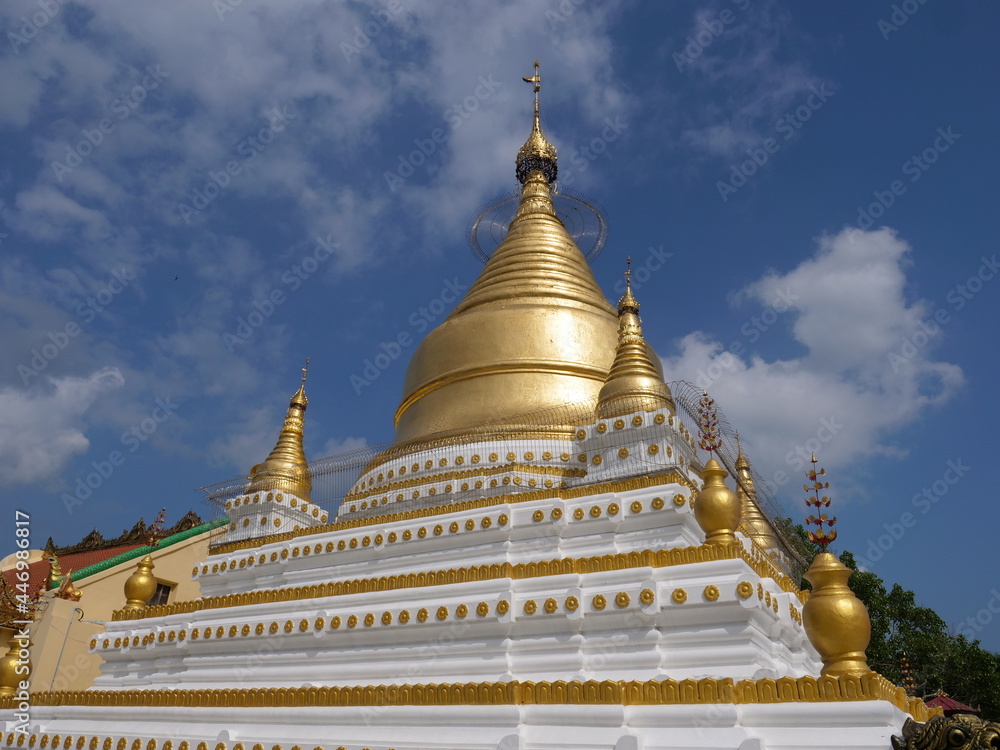 Naklejka premium One of the golden stupas of the Buddhist temple Mandalay, Myanmar (Burma)