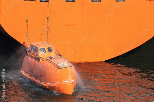 totally-enclosed lifeboat with activated fire protection system photo