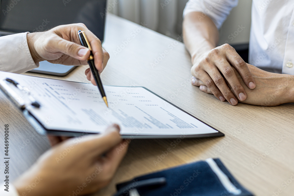 The doctor shows a document informing the results of the examination, the doctor explains the results of the tests found and treatment guidelines. Concept of examination and treatment of disease.